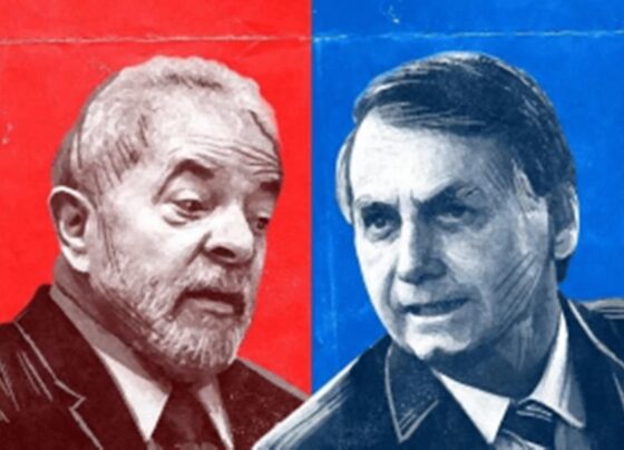 Arte mostra desenhos dos candidatos à presidência Lula e Bolsonaro sob as cores, respectivamente, vermelho e azul - Metrópoles